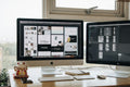 Developer maintaining a website on two monitors – 1 Month plan