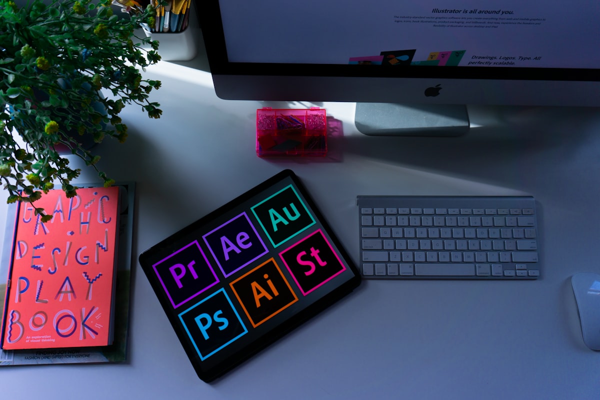 Graphic design tools on a desk – 12 Months plan